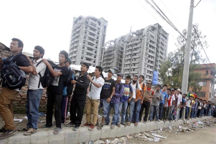 Nepali youth in line